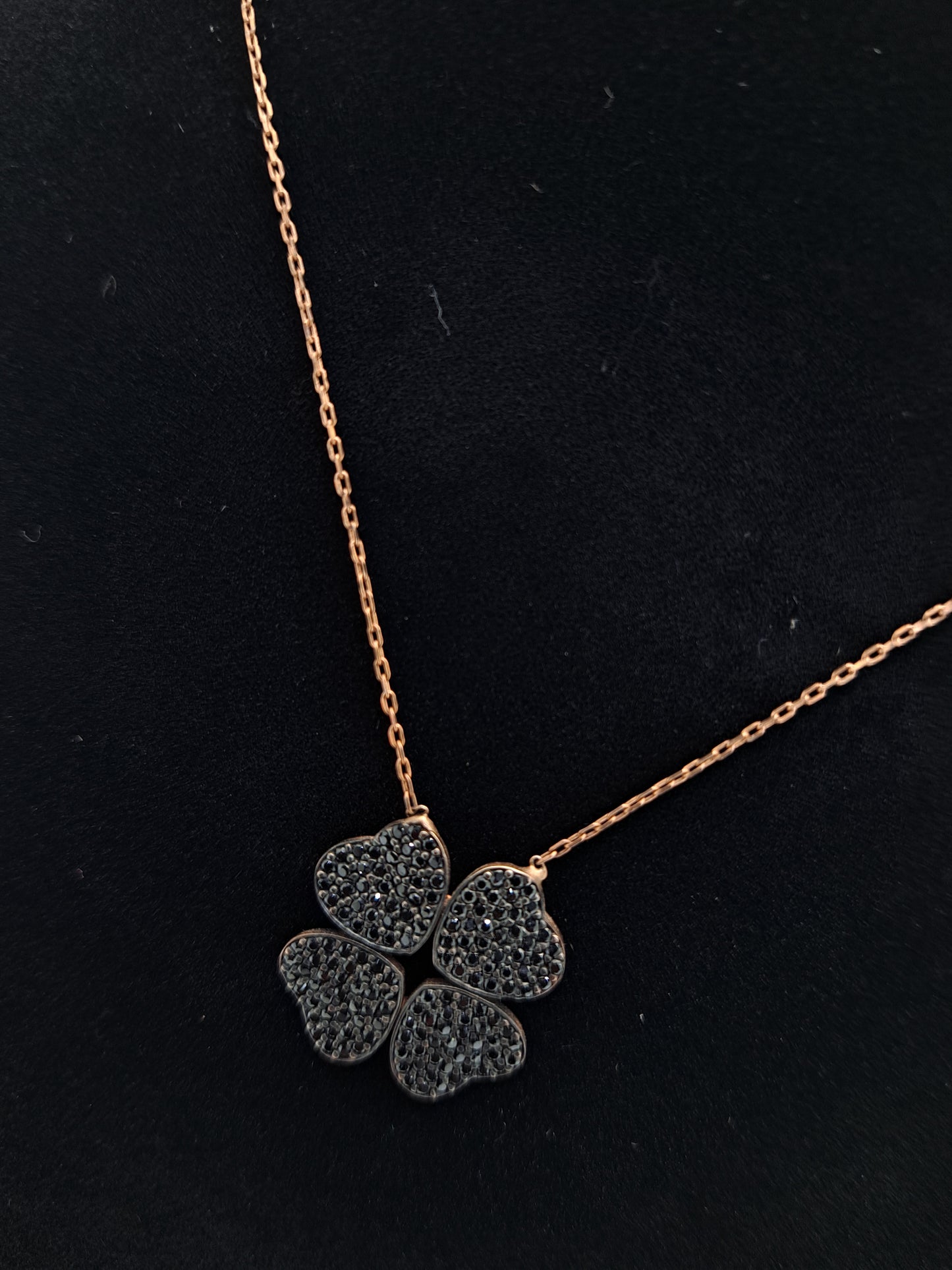 Rose gold Thin chain with a 4 Heart Blackstone Pendant