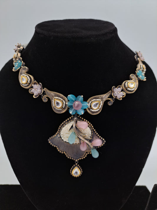 Party Wear Necklace adorned with Blue and Pink Stones