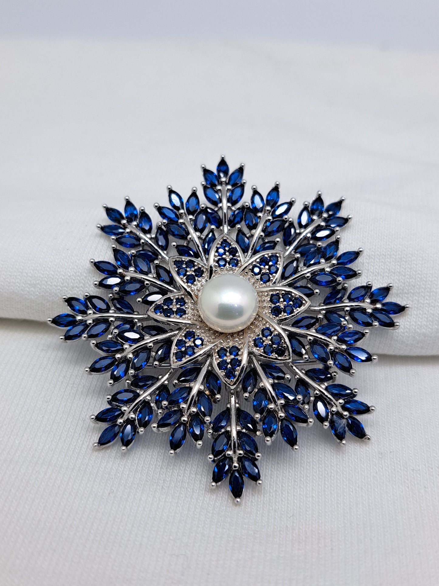 92.5 Silver Floral Design with Pearl centered Blue stoned Saree Brooch