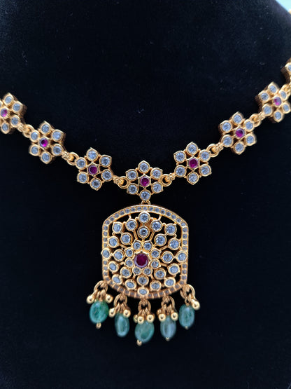 White stone Ruby Centered Gold Polish Necklace