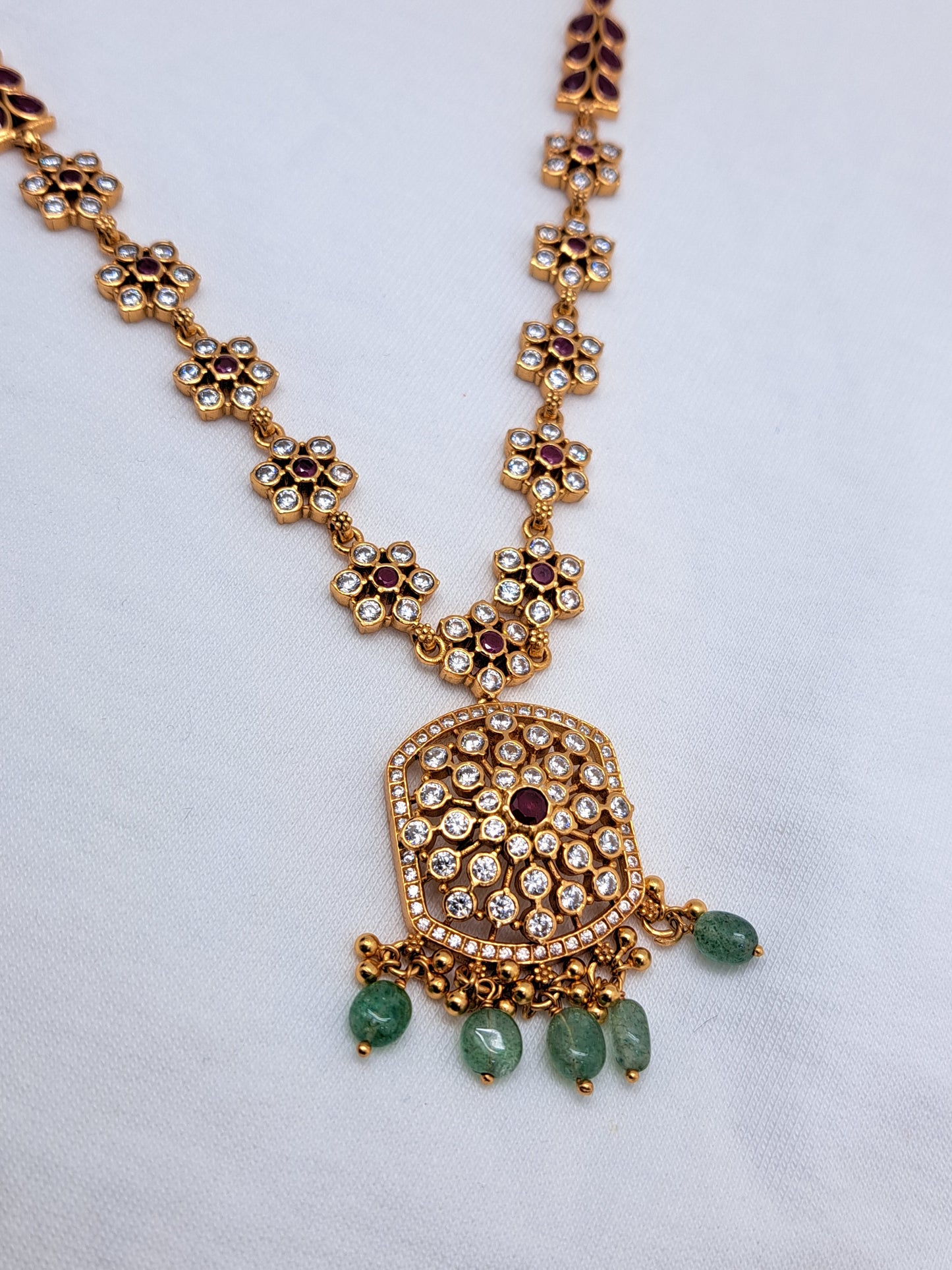 White stone Ruby Centered Gold Polish Necklace